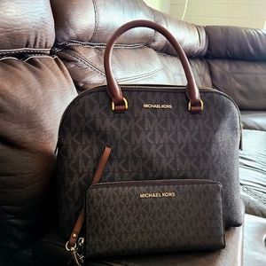 Michael Kors satchel bag and matching wallet has 3 inside pockets